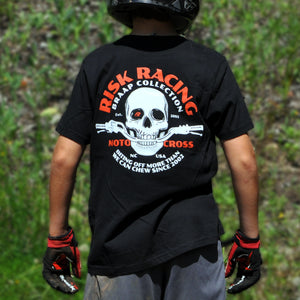 Lifestyle image of Risk Racing's Bones & Bars Youth T-Shirt (Back side)